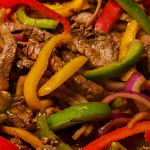 Steak and mixed peppers baked in the oven